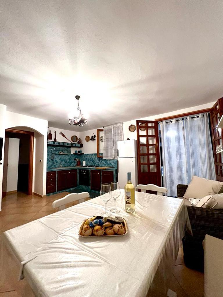 Villa Degli Angeli - Appartamento Portopinetto Porto Pino Extérieur photo